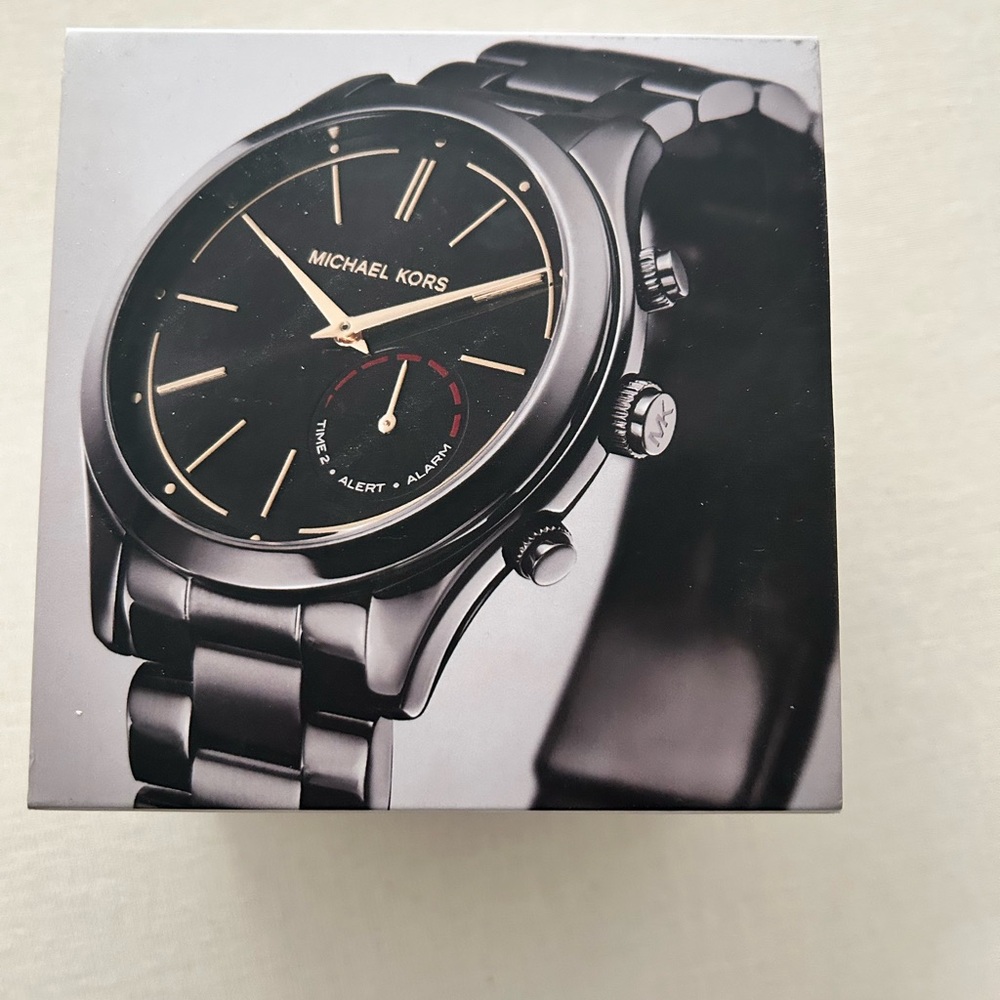 Michael Kors Access smart watch . Still in box ! Never used or sized .